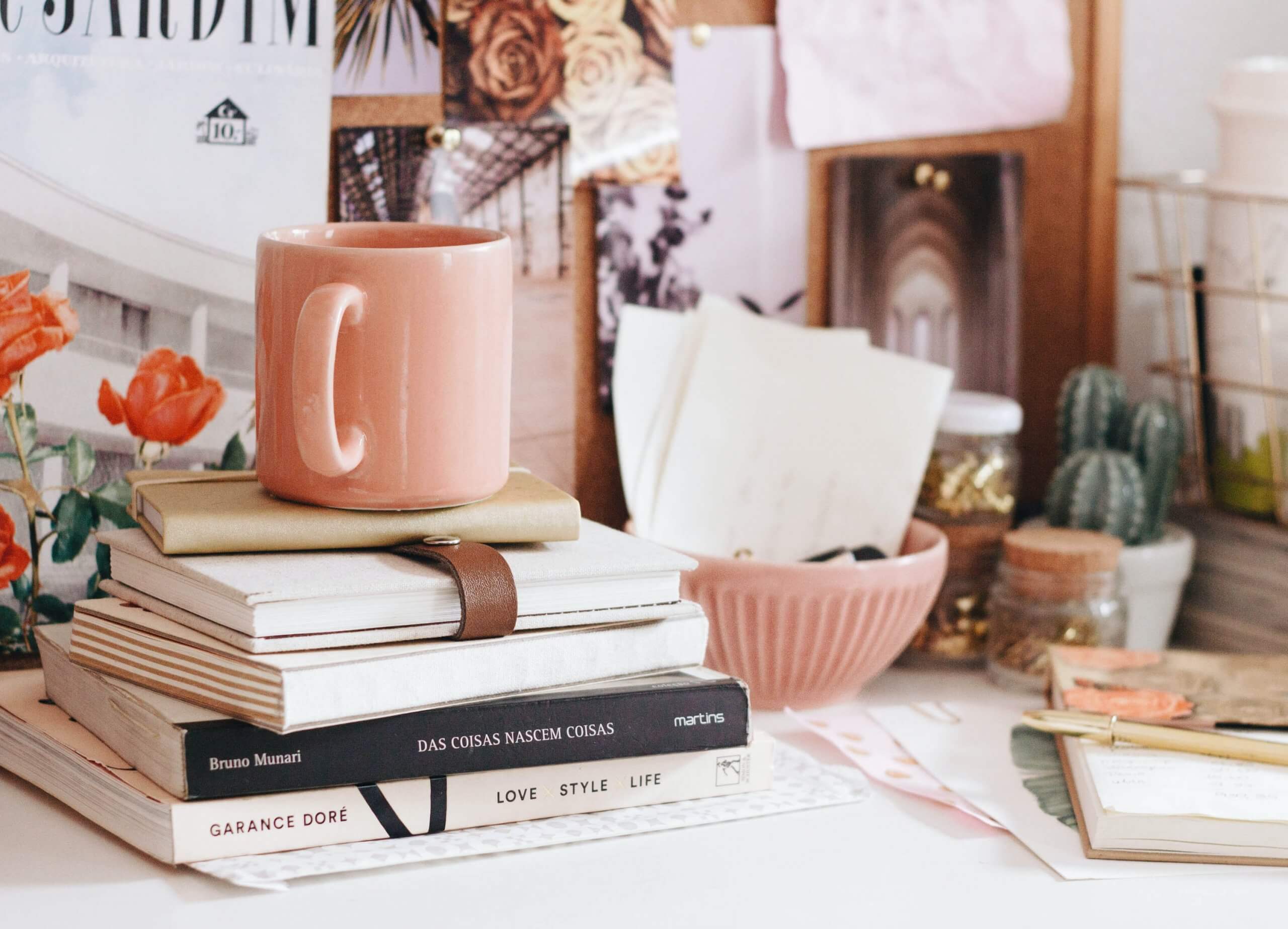 Books & Cup on Desk | The Mustcard